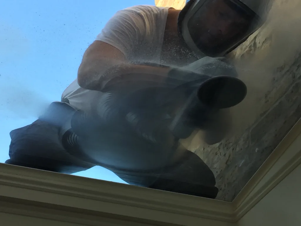 Scratched glass being polished