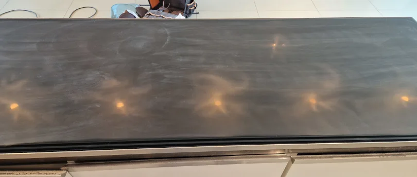 glass scratches being removed from table top