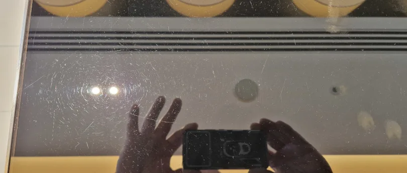 scratched glass table top close up