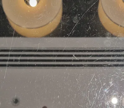 scratched glass table top