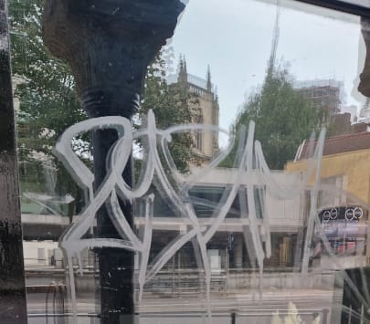 acid etch graffiti on glass